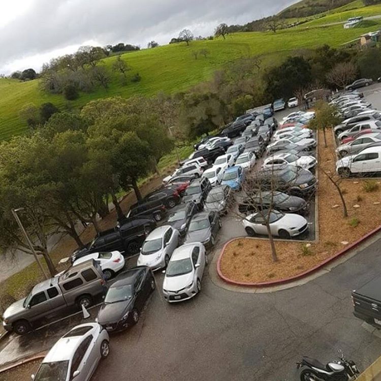 alt="Tesla Parking Lot"